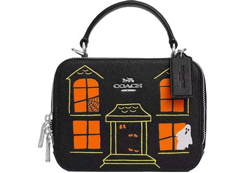 coach haunted house purse.